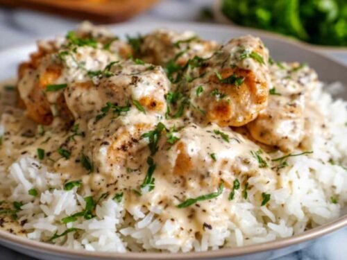 Creamy Smothered Chicken and Rice Recipe Easy Weeknight Dinner.